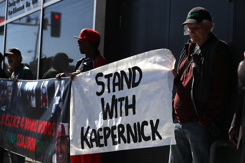 Protestors demonstrate in support of San Francisco 49ers quarterback Colin Kaepernick outside of the San Francisco Police Officers Association offices. (Photo: Getty Images)